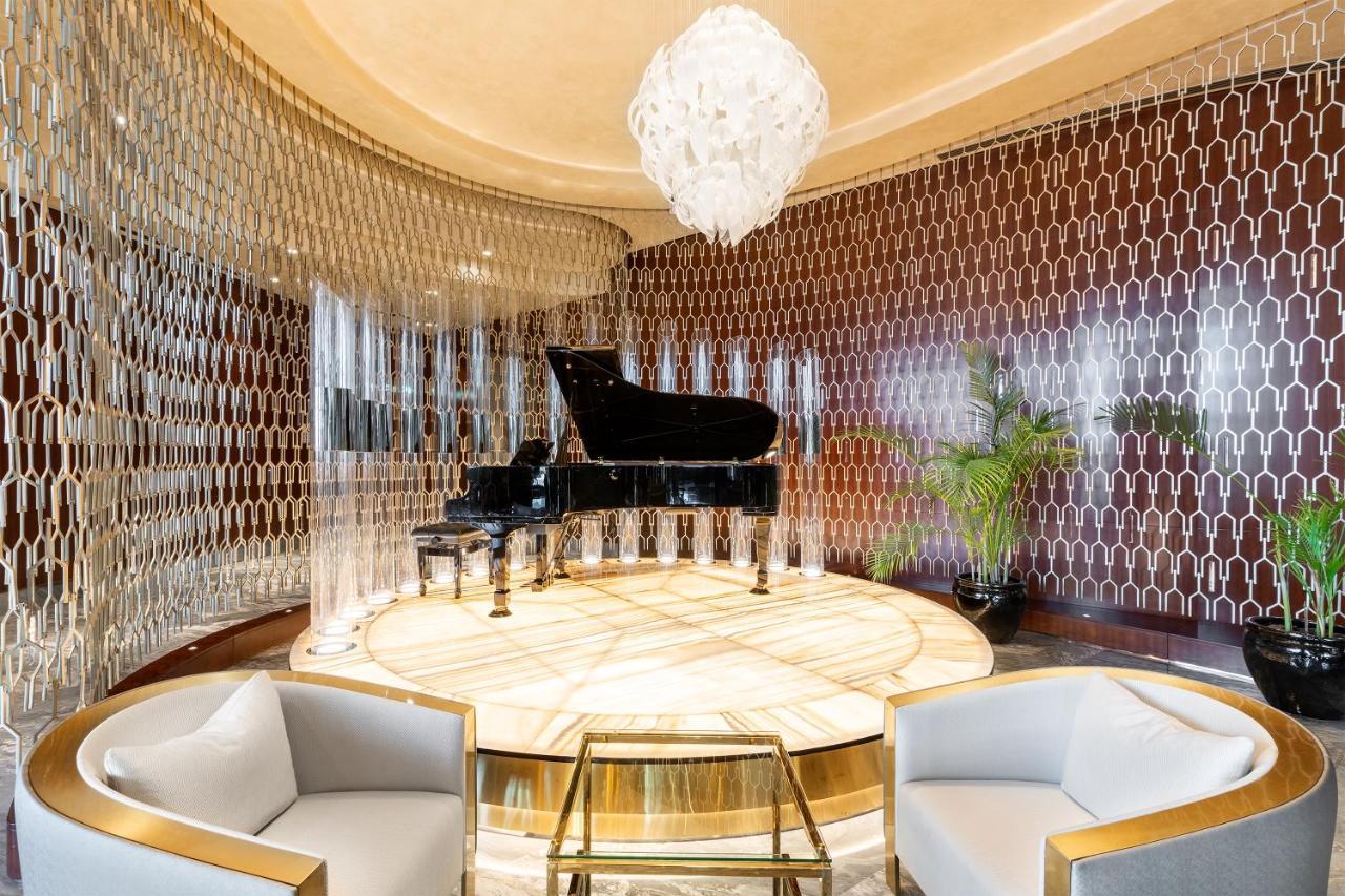 Paramount Hotel Dubai Exterior photo The piano room at the Four Seasons Hotel in Paris